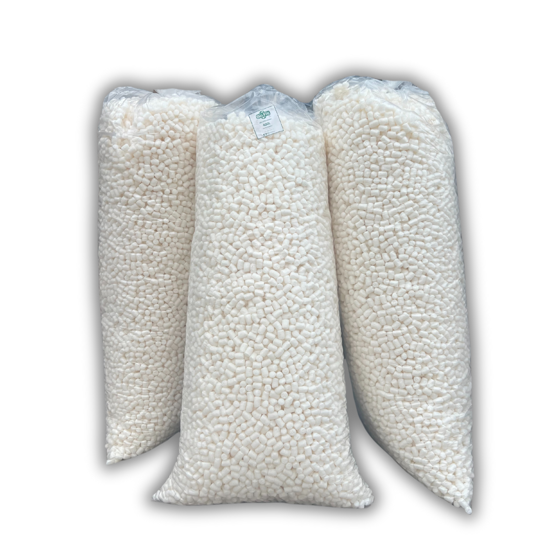 Three bags of BioFill Packing Nuts, which are eco-friendly void fill material, displayed against a white background.