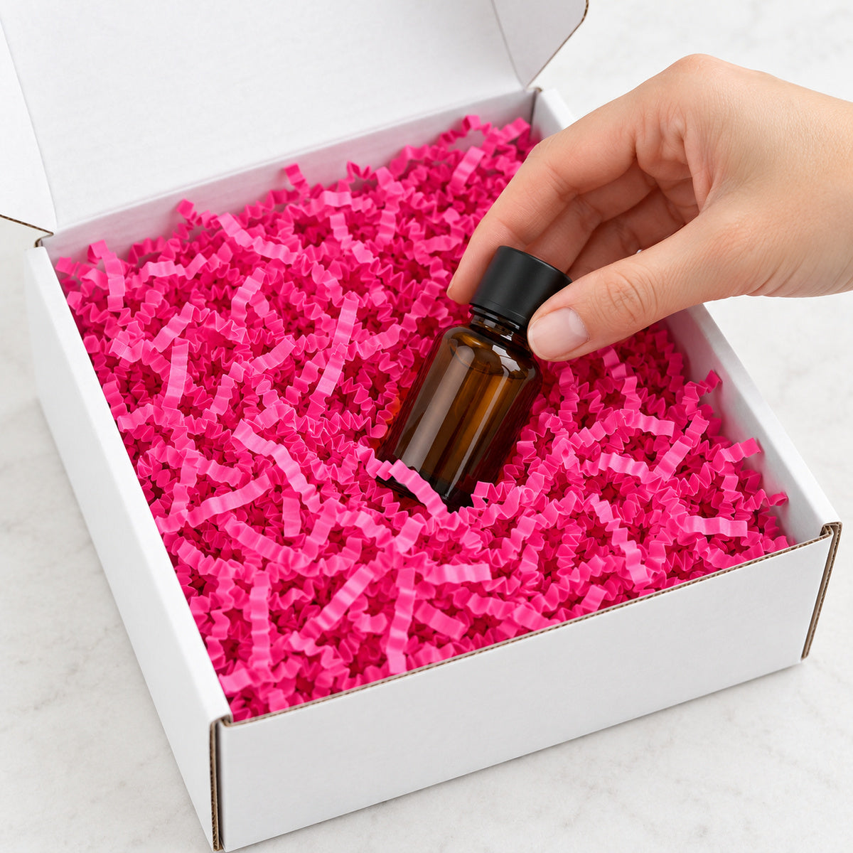 Hot Pink shredded paper filler - packing scene