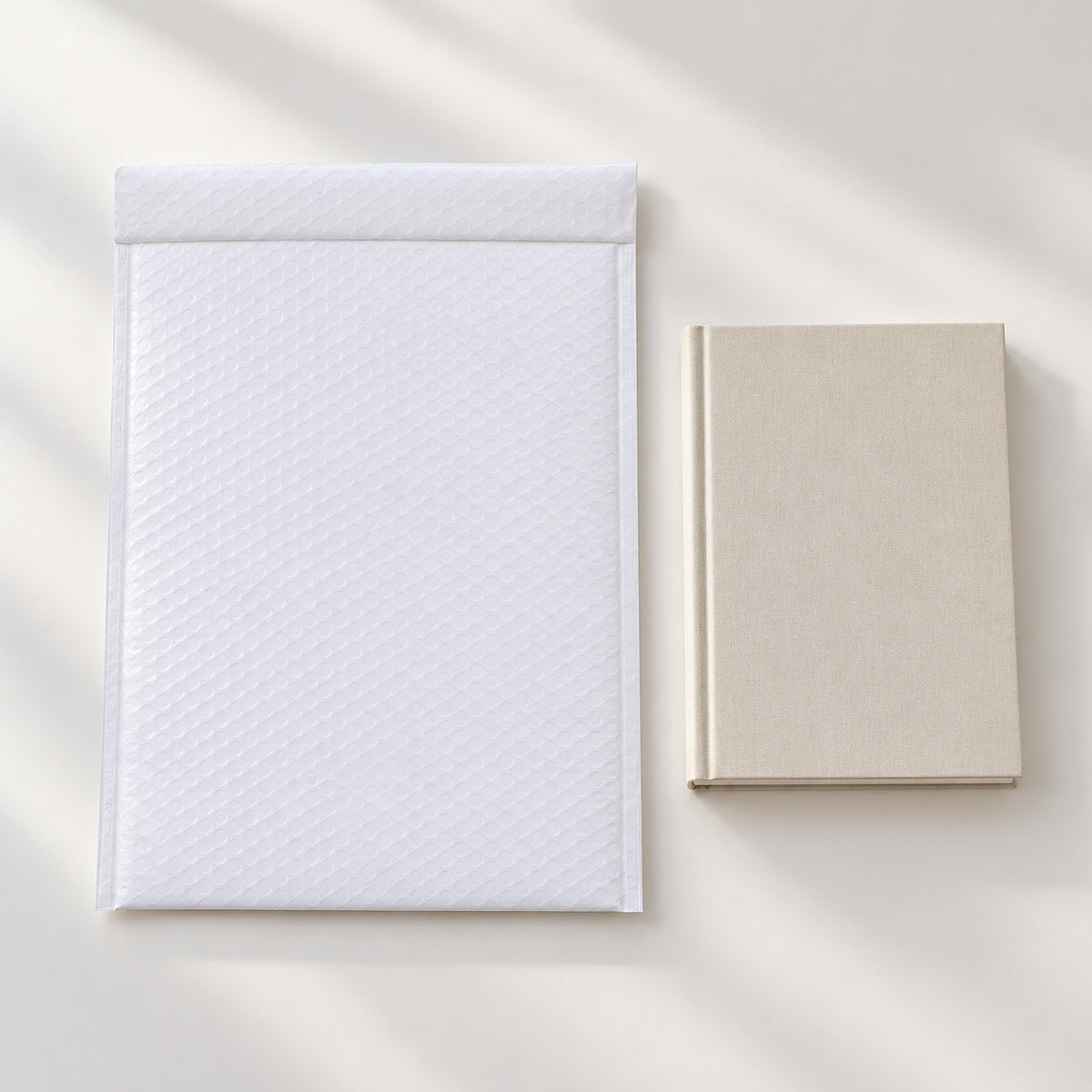 G6 M115 white poly bubble mailer 300 x 400mm — use book