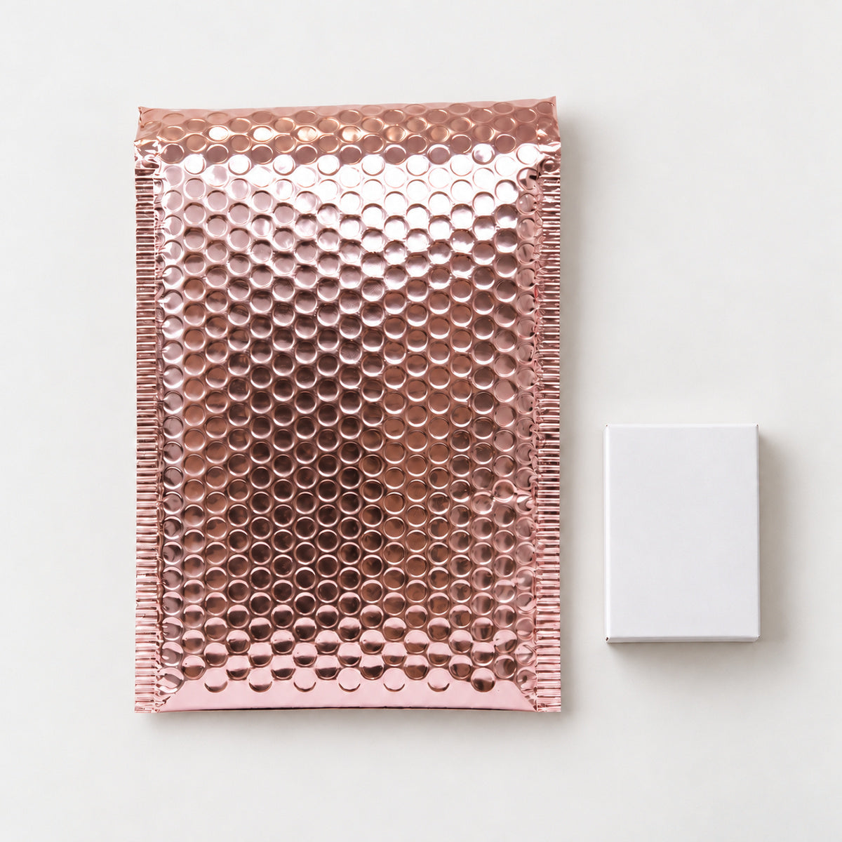 Rose Gold metallic bubble mailer 260 x 380mm - 03-use-gift