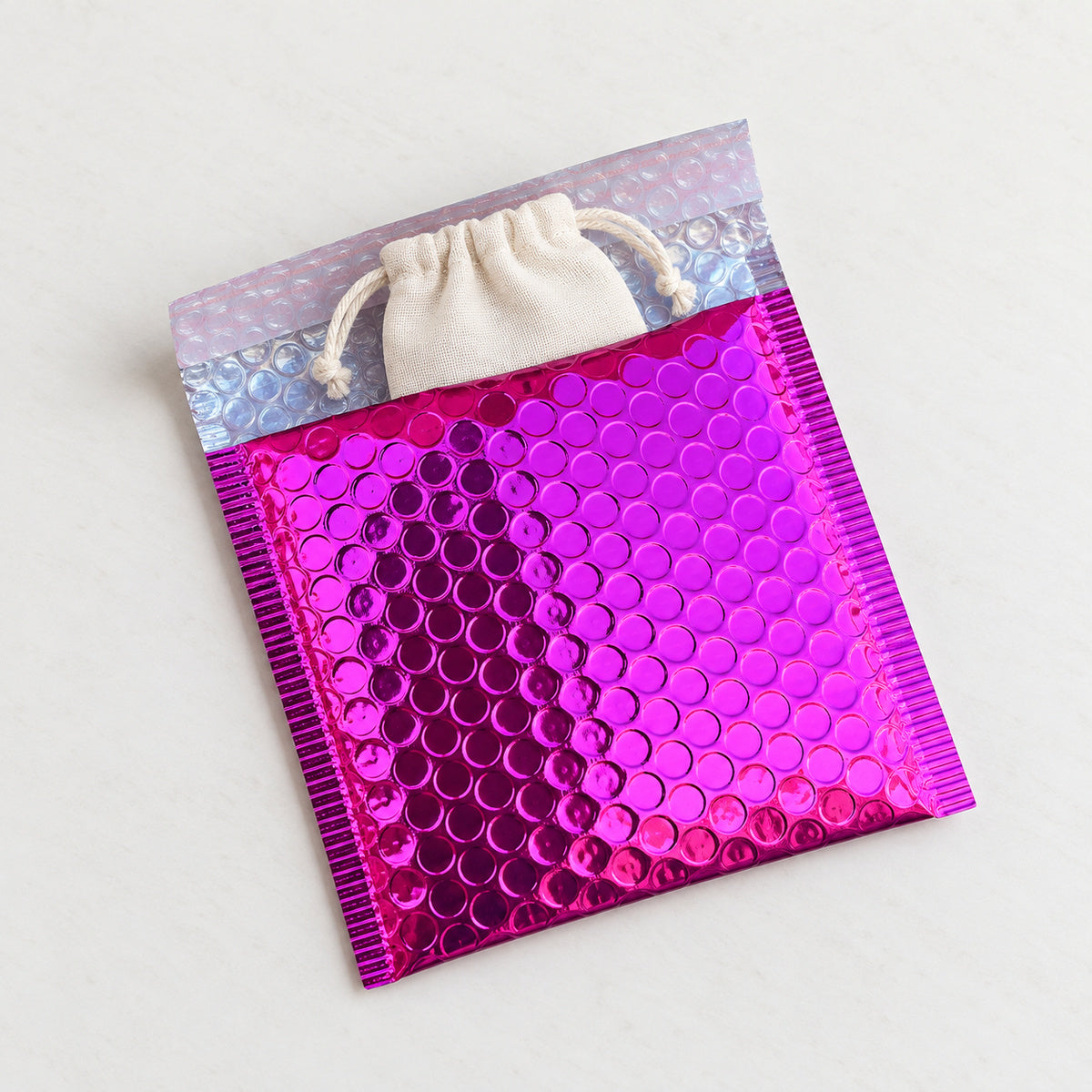Pink metallic bubble mailer 130 x 130mm - 05-use-accessory