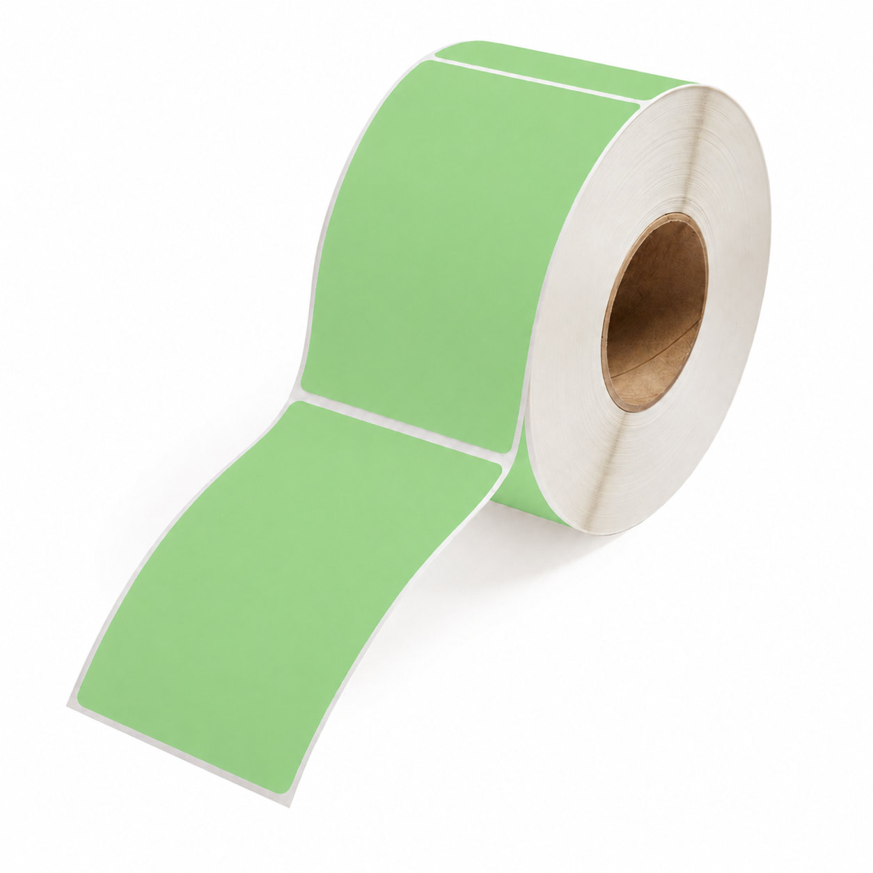 A roll of light green labels with white edges, partially unrolled to show the adhesive side and the cardboard core, set against a plain white background.
