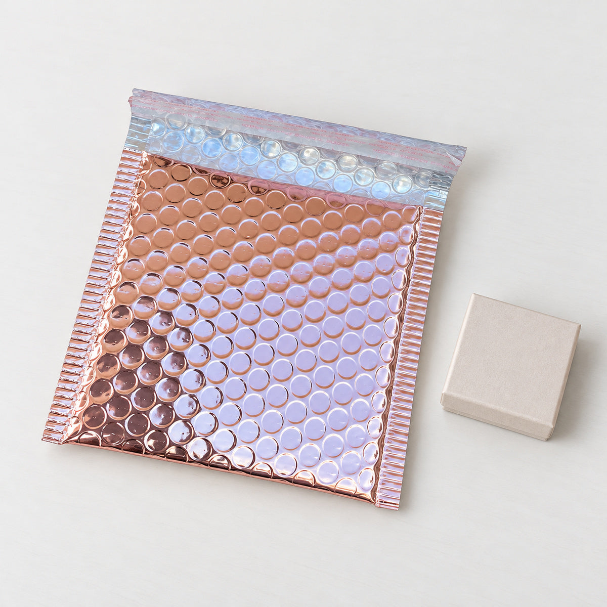 Rose Gold metallic bubble mailer 130 x 130mm - 04-use-gift