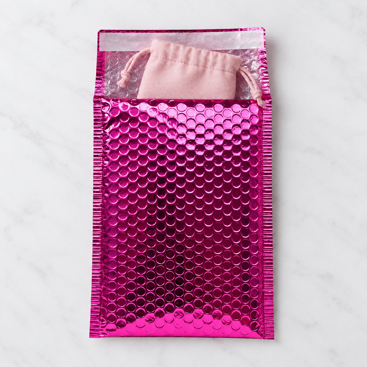 Pink metallic bubble mailer 160 x 230mm - 06-use-accessory