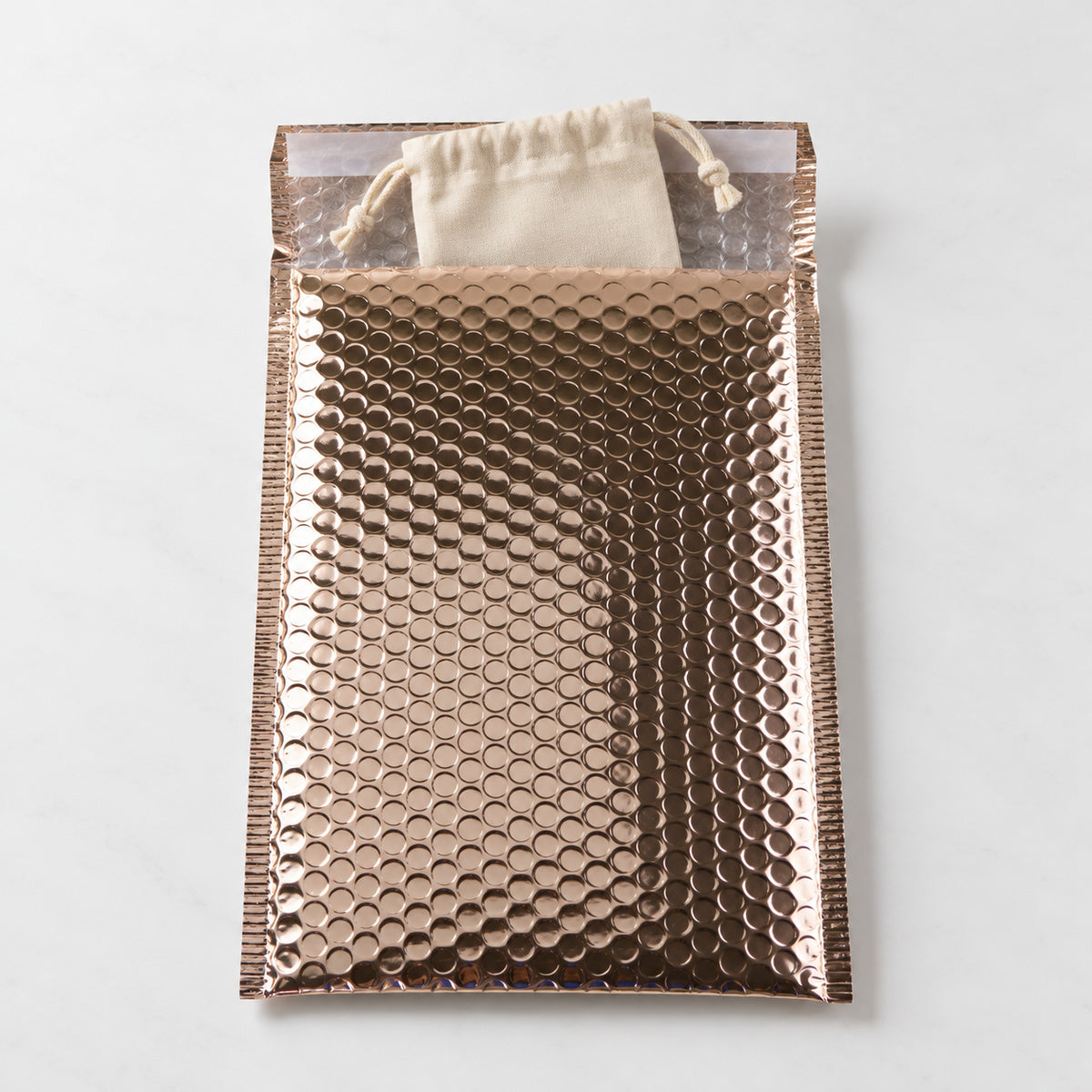 Dawn Rose Gold metallic bubble mailer 160 x 230mm - 05-use-accessory
