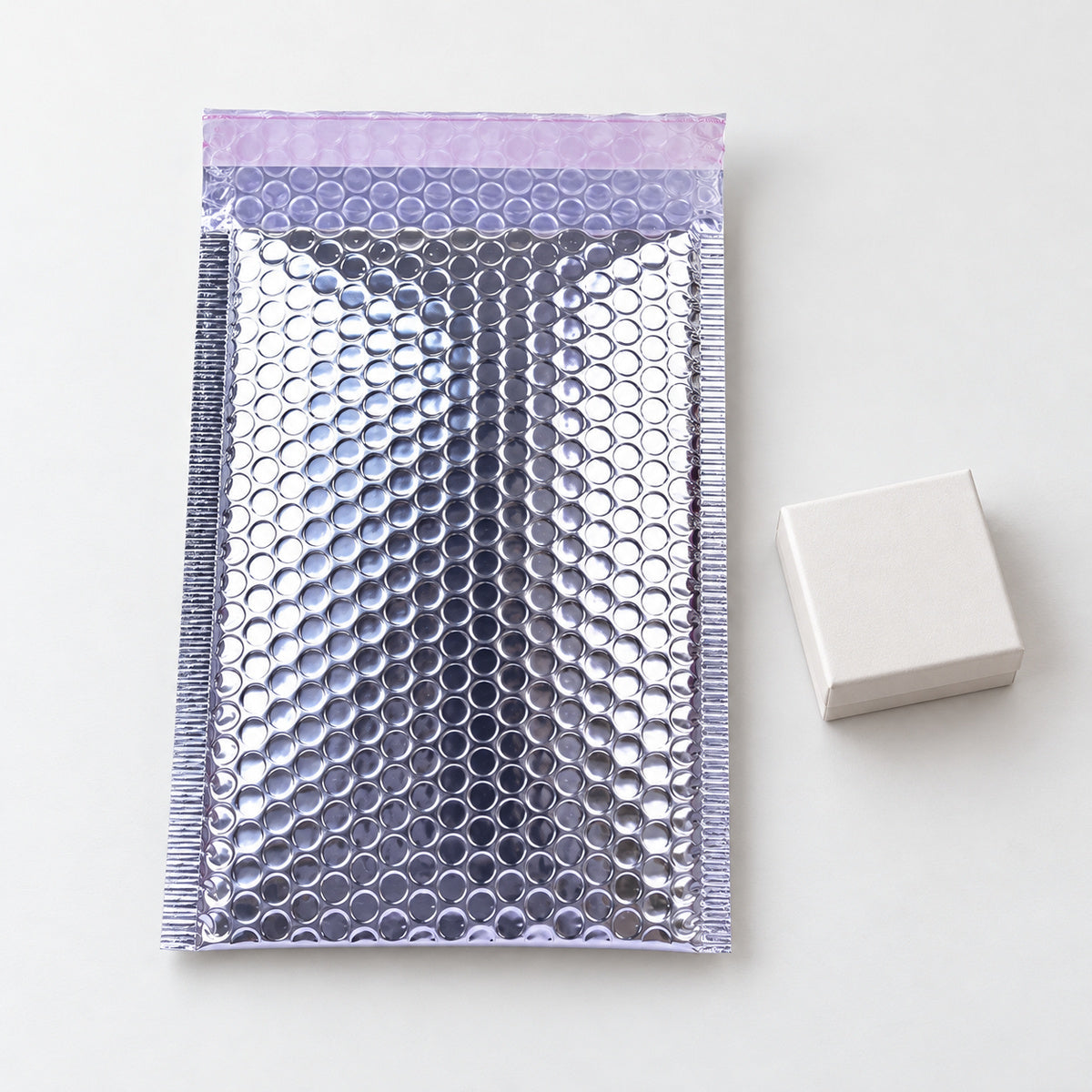 Silver metallic bubble mailer 100 x 180mm - 05-use-gift